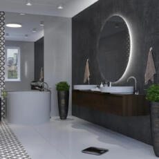 Ronde spiegel met verlichting, hangend in een badkamer