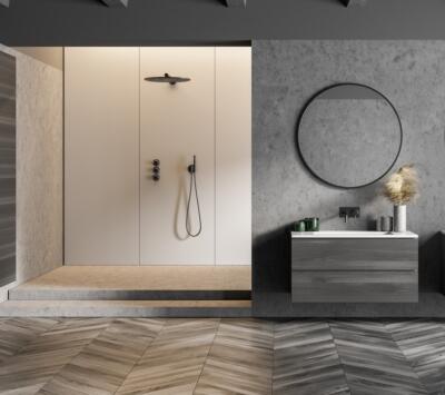 Ronde spiegel met zwart kader, hangend in een badkamer