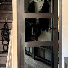 Deurspiegel grijs gekleurd